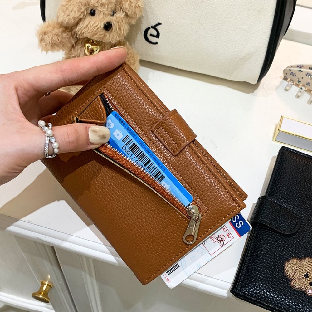 حافظة بطاقات إبداعية من الجلد  - مراجعة Passport Wallet Rfid وسعره